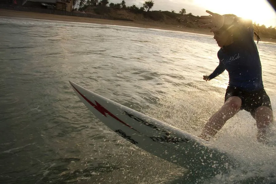 Sunset, board under the arm